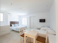 Posteľ alebo postele v izbe v ubytovaní Lectus Mykonos