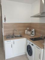 Kuchnia lub aneks kuchenny w obiekcie Studio neuf atypique centre ville Palavas vue mer