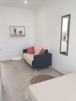 Łóżko lub łóżka w pokoju w obiekcie Studio neuf atypique centre ville Palavas vue mer