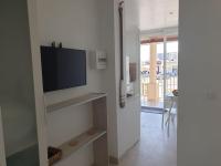 Telewizja i/lub zestaw kina domowego w obiekcie Studio neuf atypique centre ville Palavas vue mer