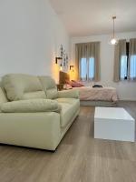 Posedenie v ubytovaní Coqueto apartamento céntrico con piscina