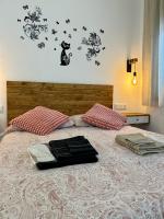 Posteľ alebo postele v izbe v ubytovaní Coqueto apartamento céntrico con piscina
