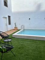 Bazén v ubytovaní Coqueto apartamento céntrico con piscina alebo v jeho blízkosti