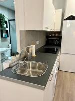 Kuchyňa alebo kuchynka v ubytovaní Coqueto apartamento céntrico con piscina