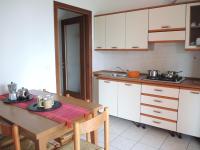 A kitchen or kitchenette at Adorable apartment with swimming pool