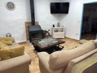 TV a/nebo společenská místnost v ubytování La casa del olivo
