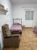 Postel nebo postele na pokoji v ubytování La casa del olivo