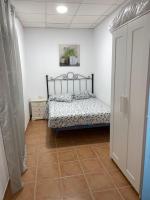 Postel nebo postele na pokoji v ubytování La casa del olivo