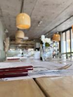 a fork and knife sitting on top of a counter at Casagrande Hotel & Beach Club in José Ignacio