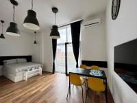 Posteľ alebo postele v izbe v ubytovaní Loft Premium Apartments