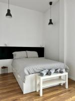 Posteľ alebo postele v izbe v ubytovaní Loft Premium Apartments
