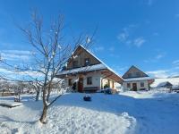 Ca' Fam Chalets v zime