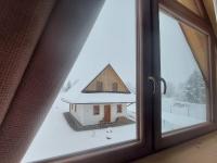 Ca' Fam Chalets v zime
