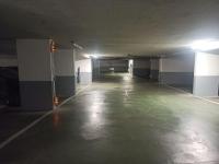 an empty parking garage with an empty parking lot at Cozy - Free Parking - 15mn from Paris Montparnasse in Clamart