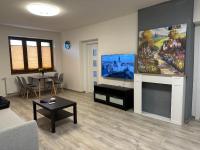 TV a/nebo společenská místnost v ubytování Apartment Golden Prague 78