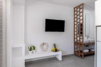 Televízia a/alebo spoločenská miestnosť v ubytovaní Kellys Luxury Apartments