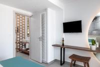 Televízia a/alebo spoločenská miestnosť v ubytovaní Kellys Luxury Apartments
