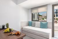 Posedenie v ubytovaní Kellys Luxury Apartments