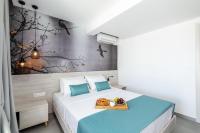 Posteľ alebo postele v izbe v ubytovaní Kellys Luxury Apartments