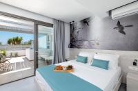 Posteľ alebo postele v izbe v ubytovaní Kellys Luxury Apartments