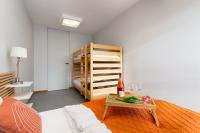 Posteľ alebo postele v izbe v ubytovaní Apartamenty Porta Mare by Noclegi Renters