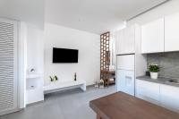 Televízia a/alebo spoločenská miestnosť v ubytovaní Kellys Luxury Apartments
