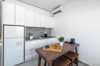Kuchyňa alebo kuchynka v ubytovaní Kellys Luxury Apartments