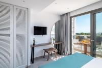 Televízia a/alebo spoločenská miestnosť v ubytovaní Kellys Luxury Apartments