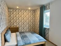 Posteľ alebo postele v izbe v ubytovaní Zielone Apartamenty Katowice Chorzów
