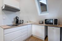 Dapur atau dapur kecil di Charmant appartement en plein centre du Pouliguen!