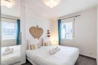 Łóżko lub łóżka w pokoju w obiekcie Beautiful apartment with balcony - Center Cannes