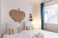 Łóżko lub łóżka w pokoju w obiekcie Beautiful apartment with balcony - Center Cannes