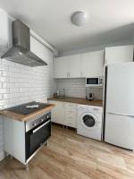 Kuchyň nebo kuchyňský kout v ubytování Pool view apartment Primavera