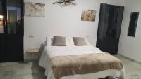 Posteľ alebo postele v izbe v ubytovaní CASA MORENA MiA APARTAMENTOS