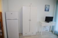 Televízia a/alebo spoločenská miestnosť v ubytovaní APPARTEMENT LE DAUPHIN