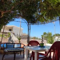 Patio lub wspólna przestrzeń na świeżym powietrzu w obiekcie Casavacanze Villa MASHALLAH