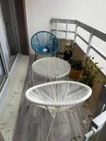 Balkon lub taras w obiekcie Cosy Duplex avec Parking à Paris 19 by immo kit bnb