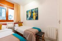 Postel nebo postele na pokoji v ubytování AC Apartamento Familiar fantástica localizacion
