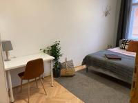 A bed or beds in a room at Dembi at the Great City Park