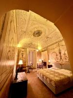 Posteľ alebo postele v izbe v ubytovaní Casa Santangelo Suites