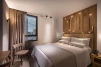 Dimargio Luxury Hotel & Spaにあるベッド