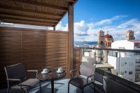 Dimargio Luxury Hotel & Spaにあるバルコニーまたはテラス