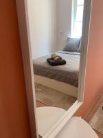Posteľ alebo postele v izbe v ubytovaní Rare Appart 2 chambres en duplex design au Panier