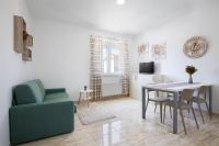 Televízia a/alebo spoločenská miestnosť v ubytovaní Apartments Villa Nina