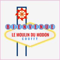 a sign for a moose moulin rouge motel at Le Moulin du Modon in Couffy