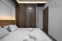 Posteľ alebo postele v izbe v ubytovaní Adelle Apartments, The Luxury Suites