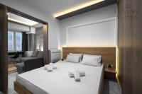 Posteľ alebo postele v izbe v ubytovaní Adelle Apartments, The Luxury Suites