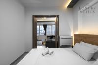 Posteľ alebo postele v izbe v ubytovaní Adelle Apartments, The Luxury Suites