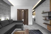 Posedenie v ubytovaní Adelle Apartments, The Luxury Suites