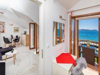 a living room with a view of the ocean at Villa Ana Apartments in Mlini